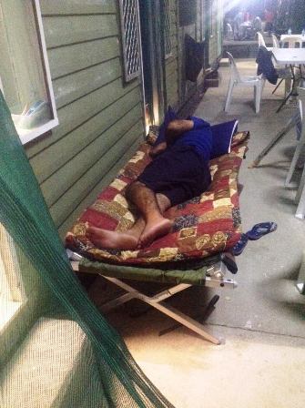 A resident of the Manus Island offshore processing centre sleeping outside. Many of the residents are from Sri Lanka