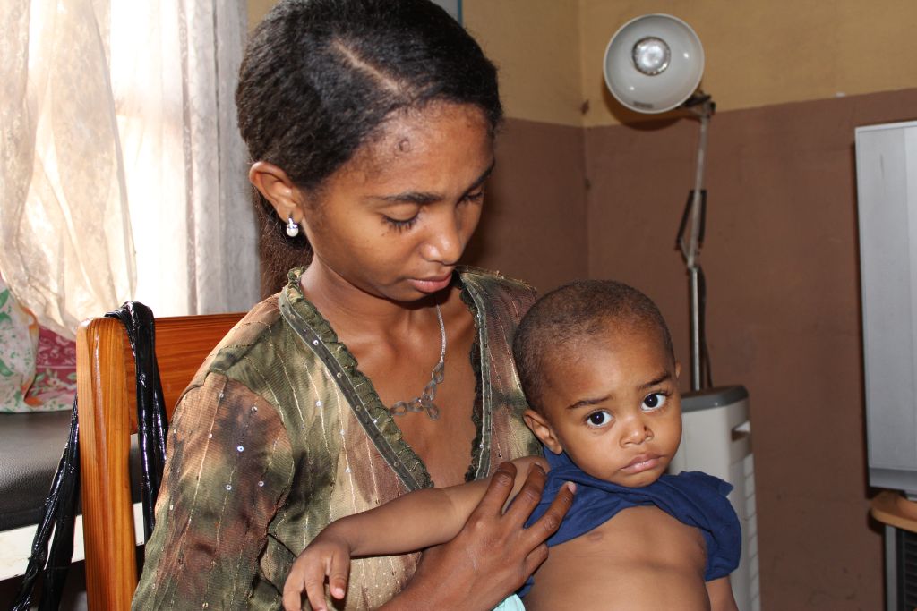 A mother at the Manakara clinic, in south eastern Madagascar, brings her child for pneumonia check-up. The child was not diagnosed with pneumonia, the country’s leading killer among children under the age of five years old.