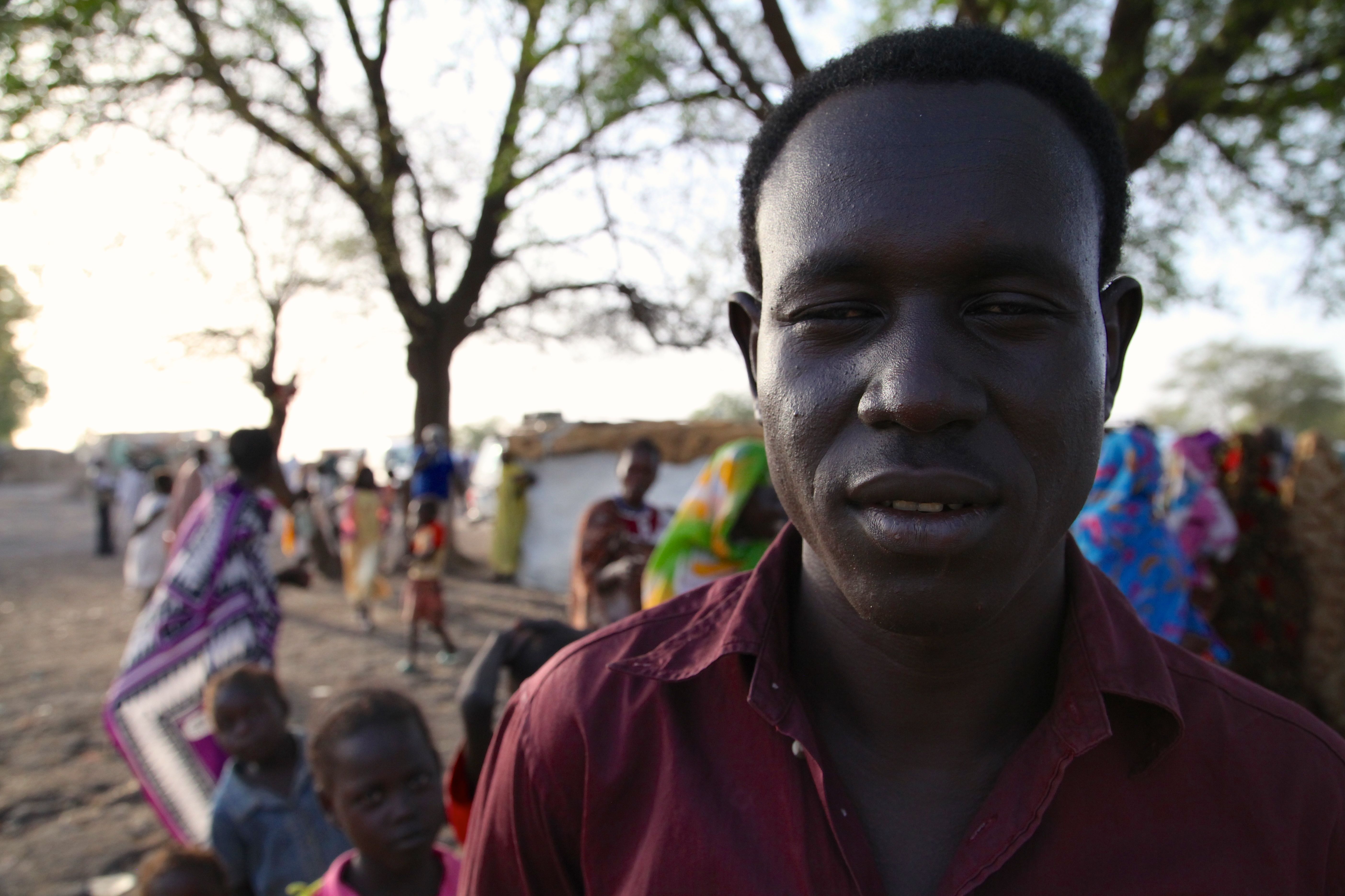 George Malual Deng, 24, has spent two years stuck in a transit site waiting to return to his home in South Sudan’s Jonglei state. He is among 20,000 people who have made a temporary home of the river port of Renk