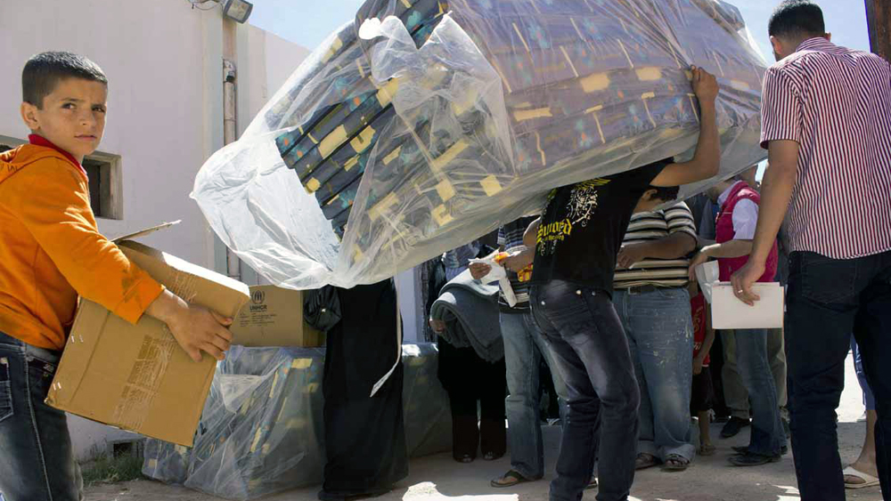 UNHCR deliver aid to Syrian refugees in Misrata, Libya