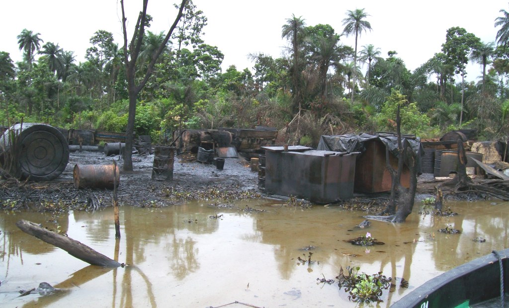 Burnt illegal oil refineries in Warri creek in the Niger Delta