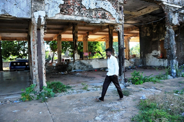 Outside a war-damaged building in northern Sri Lanka. Civilians in the former war zone say that there are far more important issues facing them than September's upcoming provincial elections