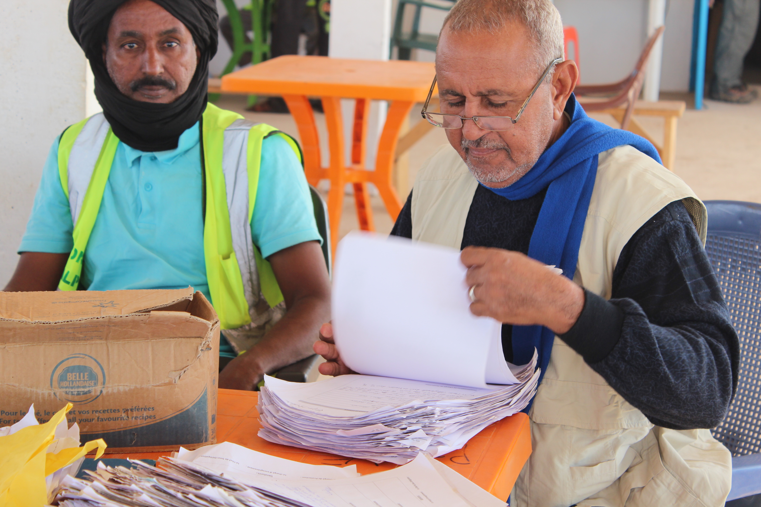 At the Centre de Litige in Mbera refugee camp in eastern Mauritania, UNHCR staff investigate cases of 'false refugees'. So far 8000 have been struck off UNHCR's books but 400 of them reinstated following an investigation. October 2013