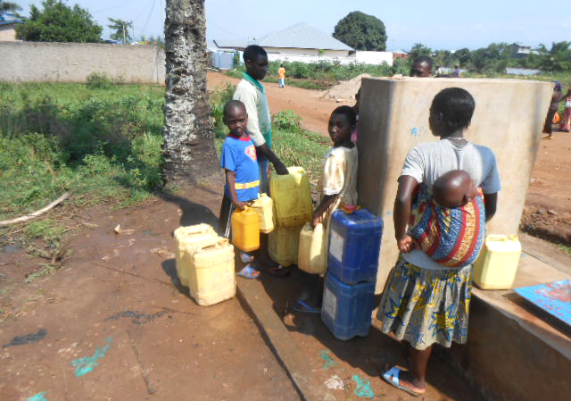 Children looking for water at a public fountain at Gisandema, in Gihosha commune, Bujumbura