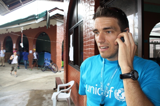 A UNICEF staff member speaking on his phone at the UN operations centre in Tacloban, one of the areas worst affected by Typhoon Haiyan, which struck the central Philippines on 8 November. Getting mobile networks up and running after a disaster are key in