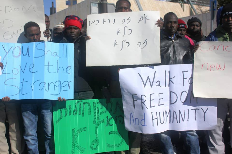 African migrants demonstrating near the Knesset in Jerusalem shortly before being arrested and returned to a new