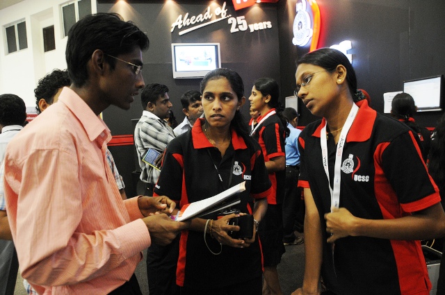 A group of university students at a science fair in Colombo
