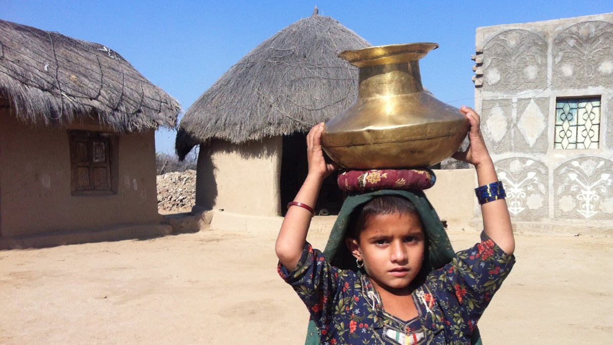 Without water services, children in Pakistan’s desert region of Tharparker often need to fetch water instead of attending school