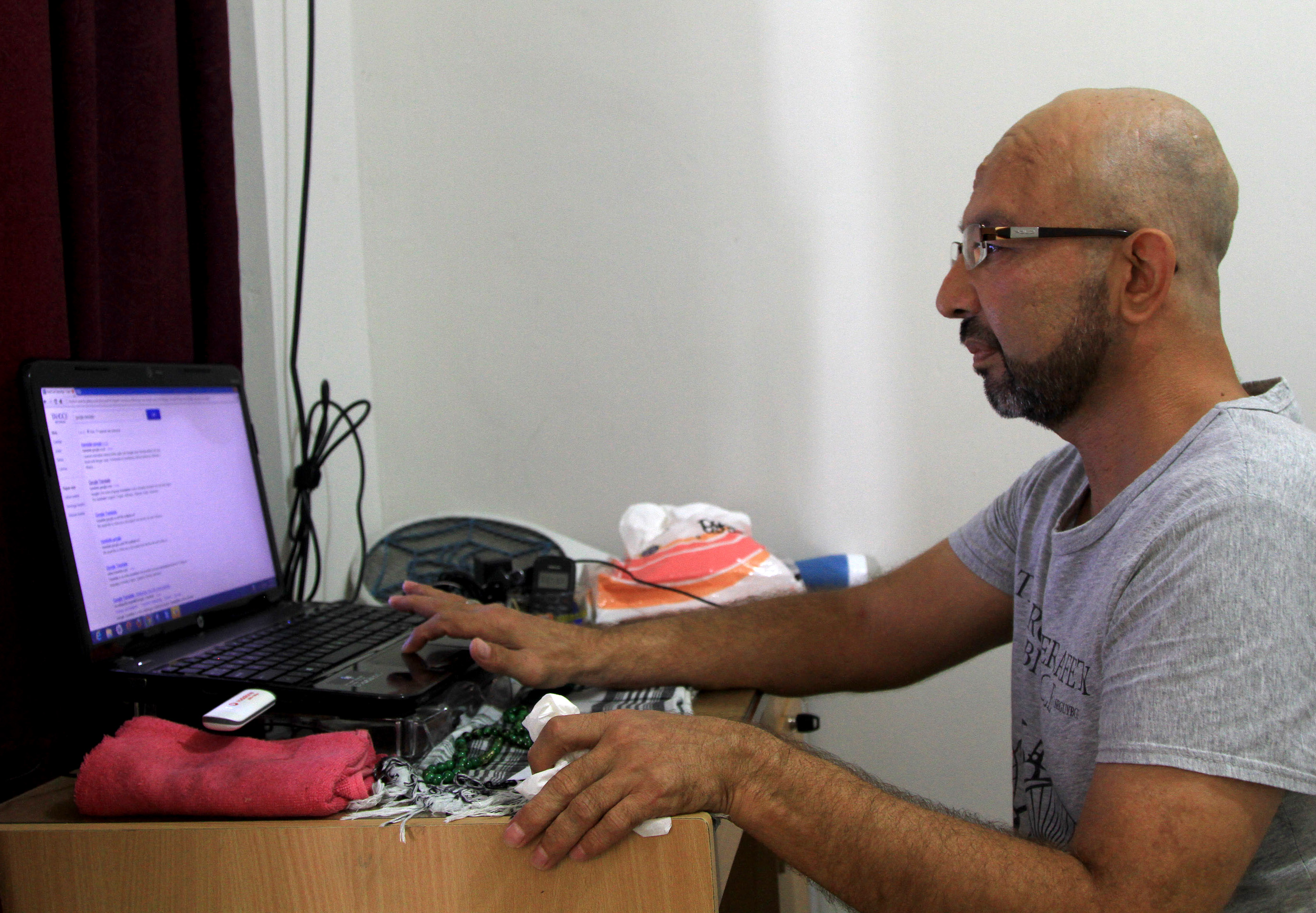 Aalim Allahyar, a refugee from Afghanistan, has been in Indonesia for two years, waiting first for his refugee application to be processed, and now for resettlement