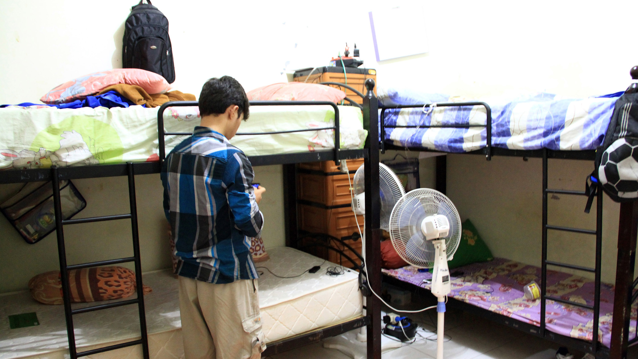 This 14-year-old Afghan refugee travelled from Pakistan to Indonesia with smugglers and now stays in a shelter for unaccompanied minors in Jakarta