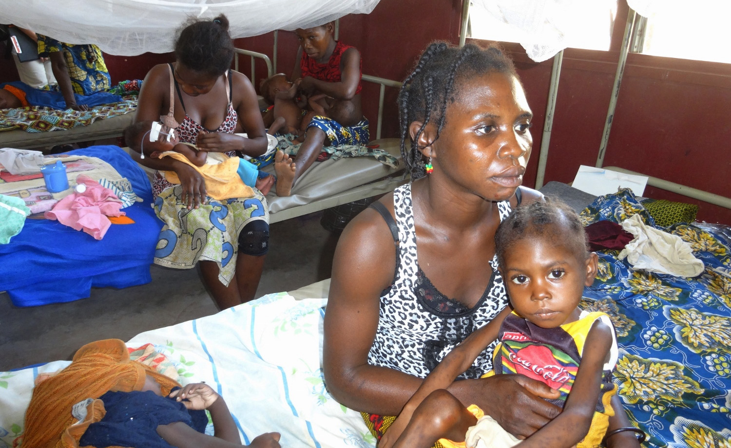 Malnourished child with mother at the Complexe Pediatrique (children's hospital) in Bangui, CAR