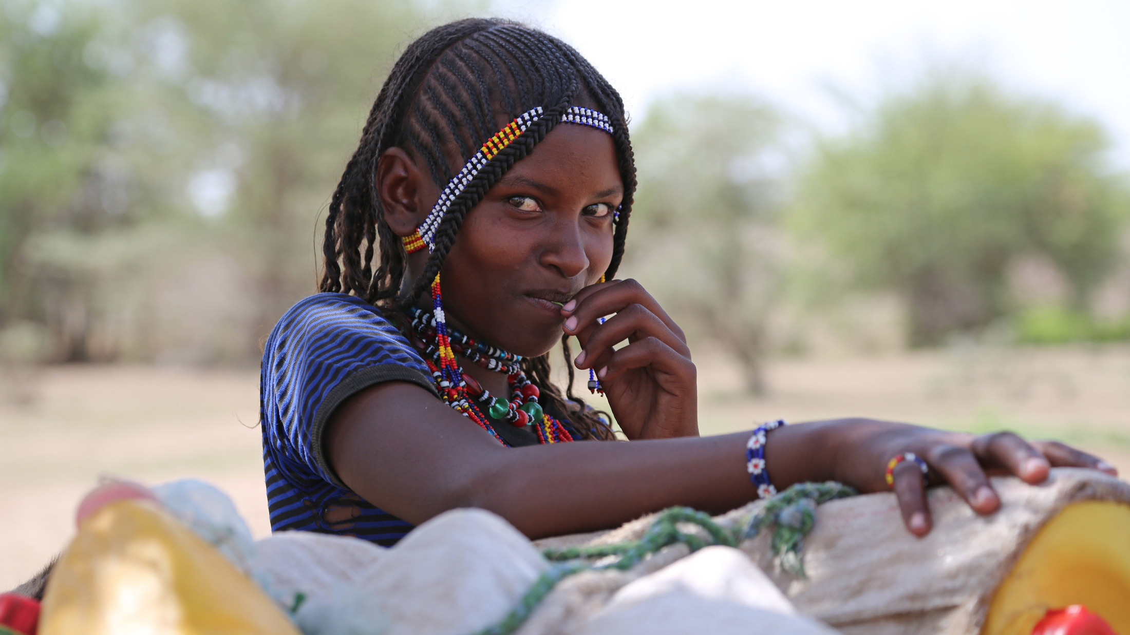 An Afar girl, Momina Ali, 13 has to take a day off from school to look for water