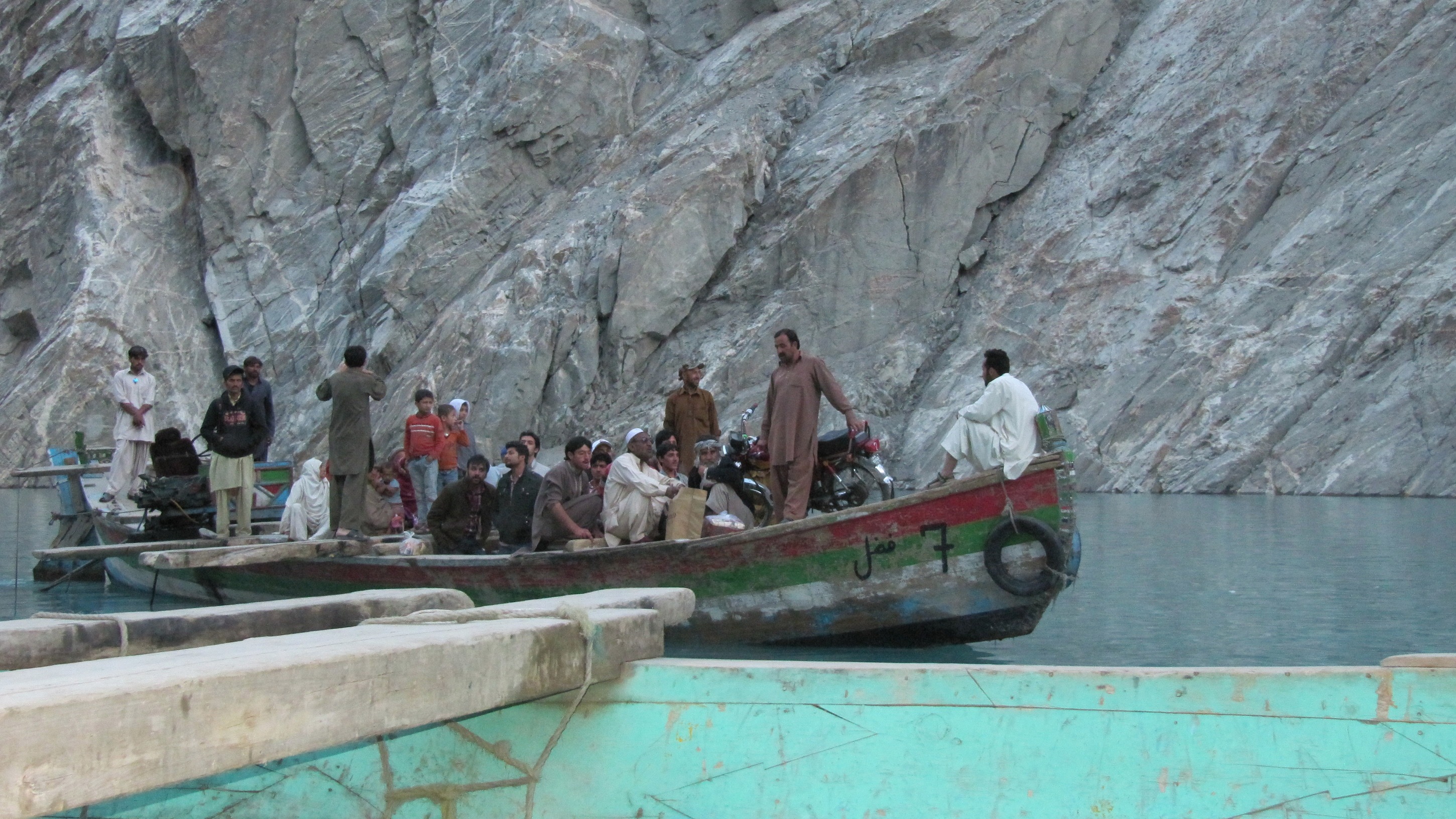 The 21-kilometer Attabad Lake was created by a landslide in 2010. Currently to cross it, goods have to be hauled onto boats.