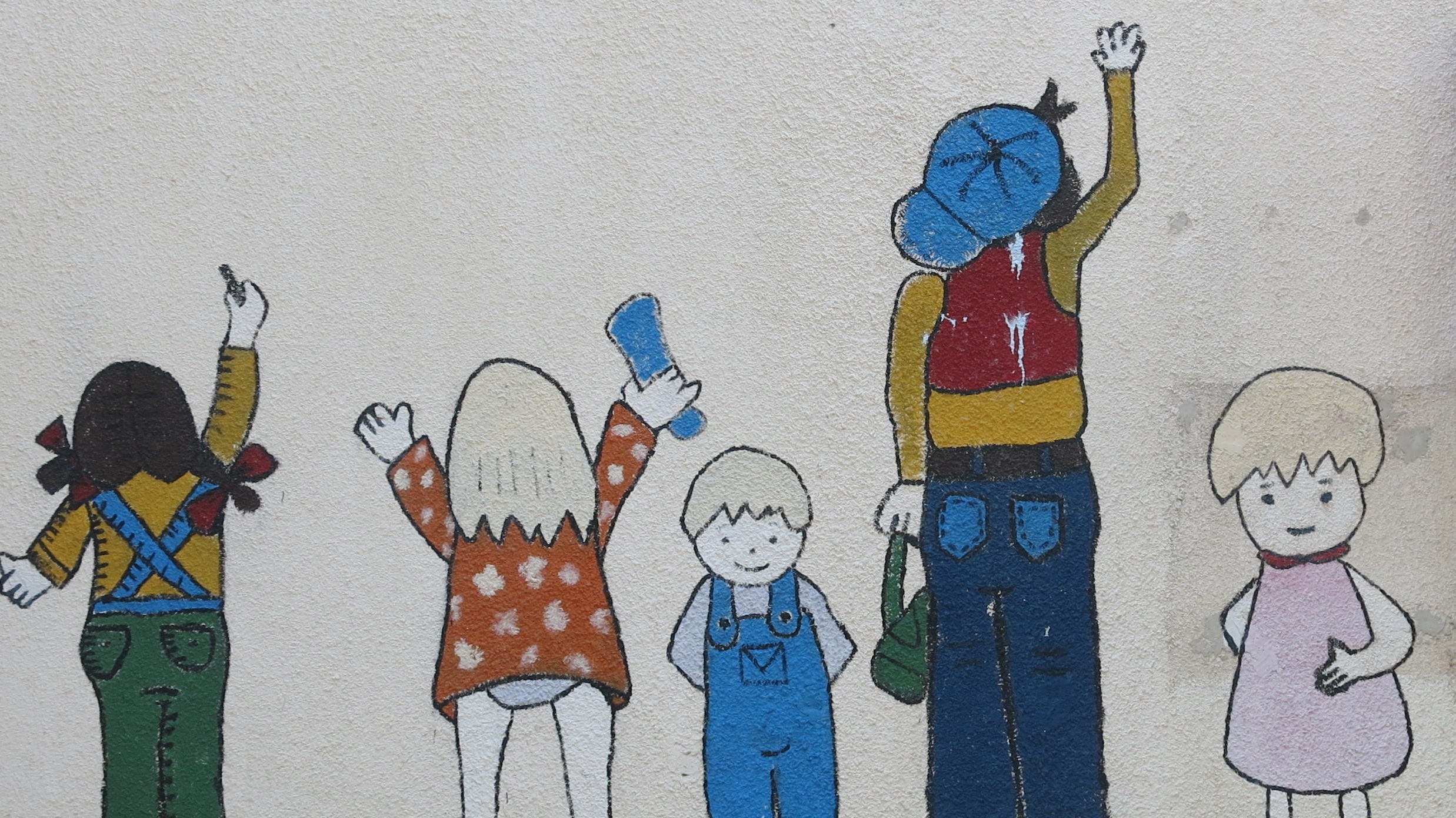 Despite the ongoing killing, some in Israel and the occupied Palestinian territories try to live together. This wall, in the mixed community of Neve Shalom, was attacked by vandals writing racist graffiti. The locals replaced it with this mural.