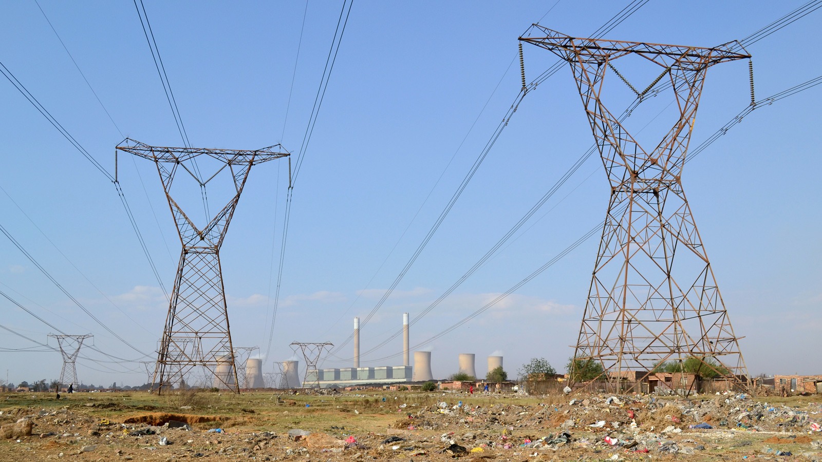 A view of Duvha Power Station from Masakhane informal settlement in South Africa’s Mpumalanga Province. Despite their proximity to the power station, residents lack electricity and must rely on burning coal to cook and heat their homes.