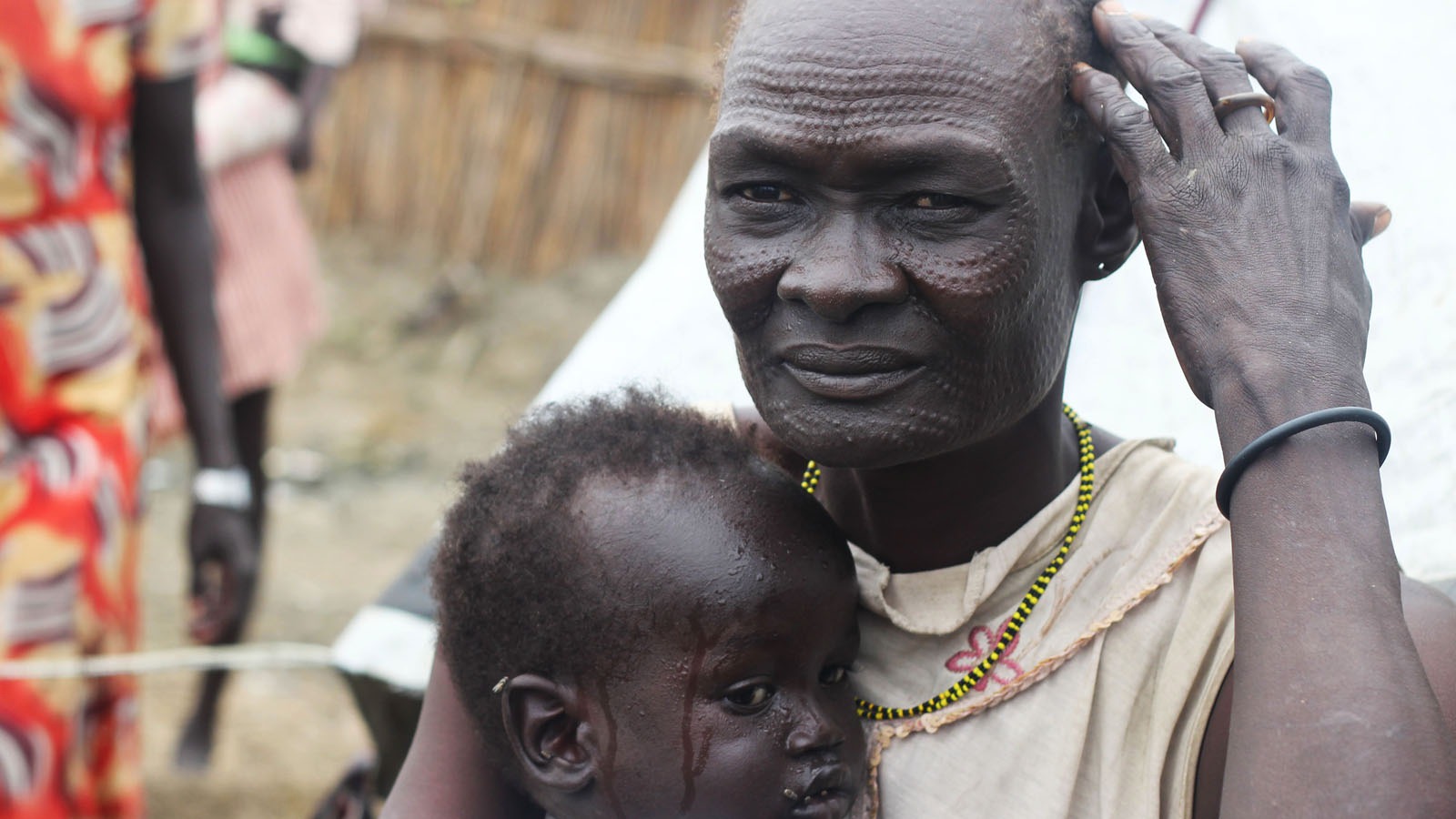 Nyalada Maliut, widowed mother of seven was shot three times when one of the frontlines passed through her rural home.
