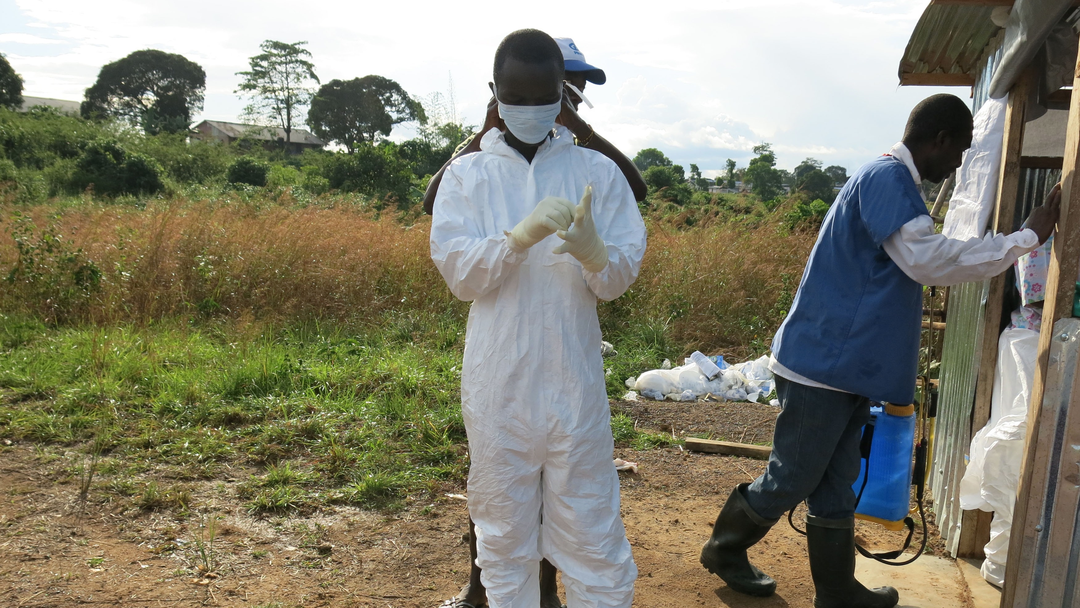 Ebola survivor Tejani Golafelay prepares to go into the Bomi Ebola Treatment Unit in Liberia to help patients.