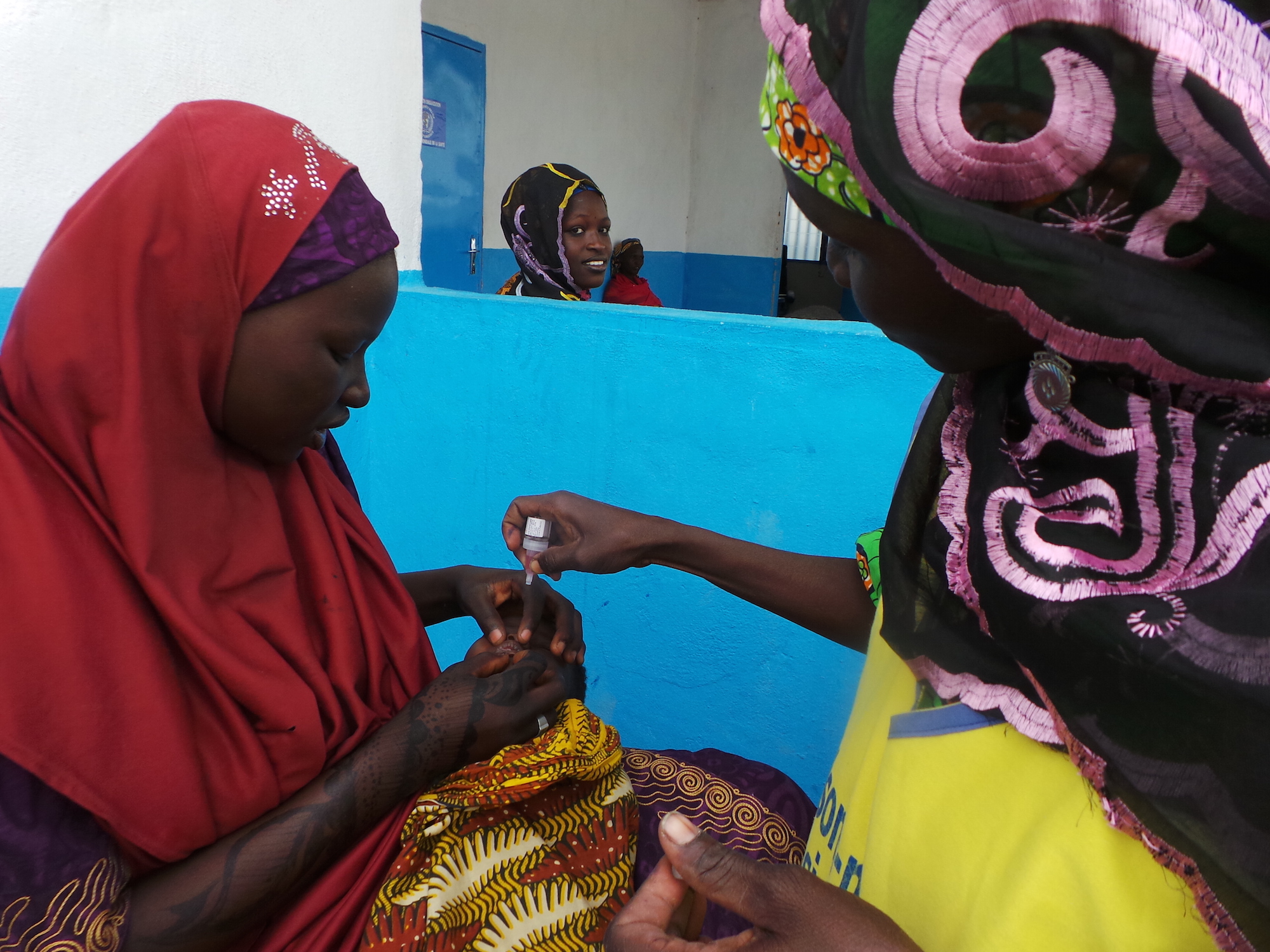 A child receives a polio vaccine at Minawao refugee camp in Cameroon's Far North Region in April 2015