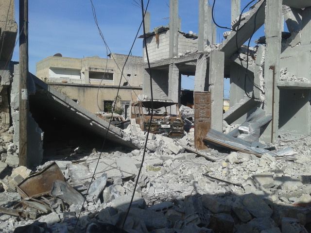 In the Syrian town of Kobani, hundreds of buildings were destroyed in a three-month battle for the city