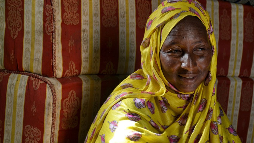 Whabi, a former female slave from the Haratine ethnic group, now makes a life for herself dying and sewing cloth veils.