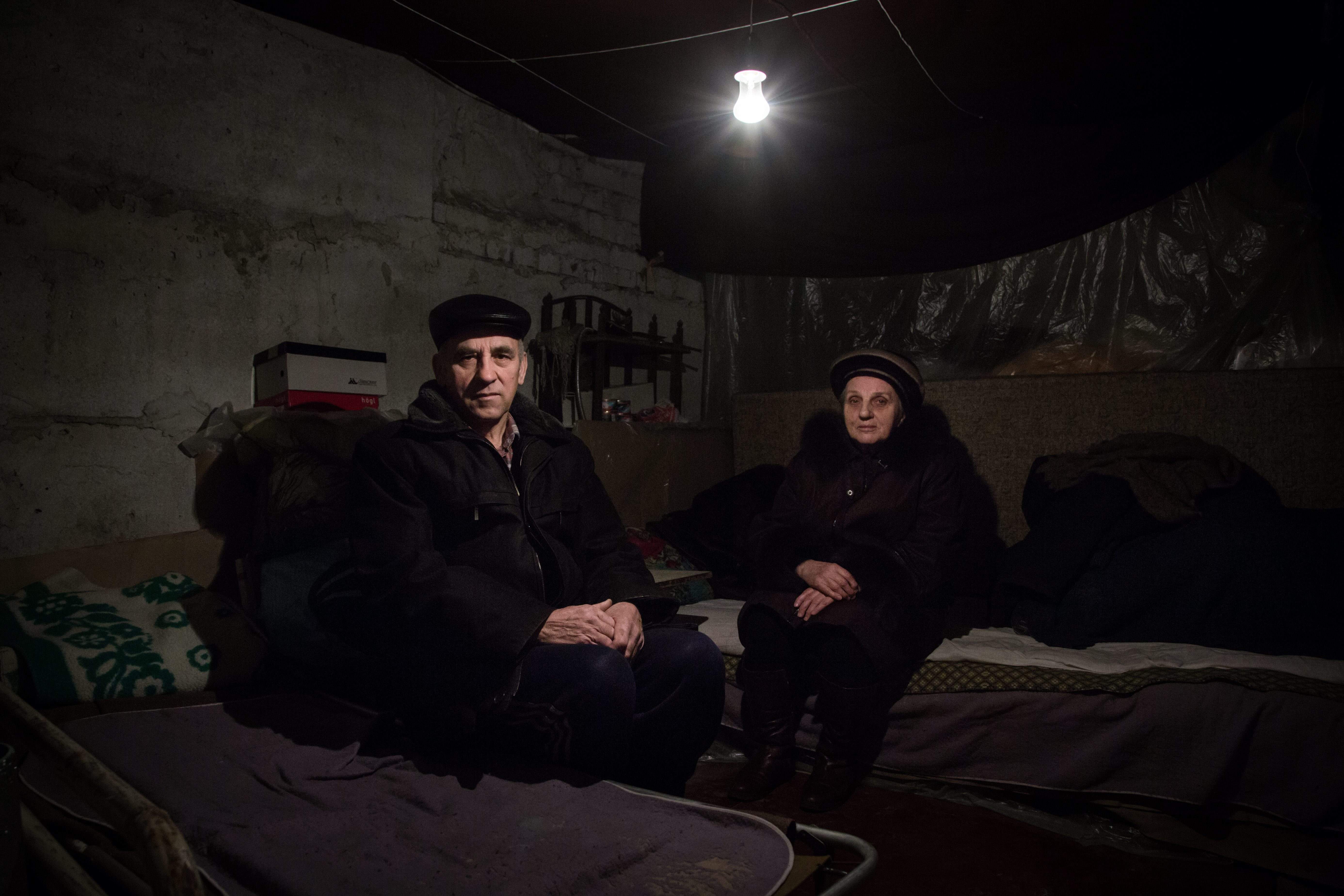 Aleksey and Anna, both 68, shelter in the basement of their apartment block in the Kievsky district of Donetsk, Ukraine.