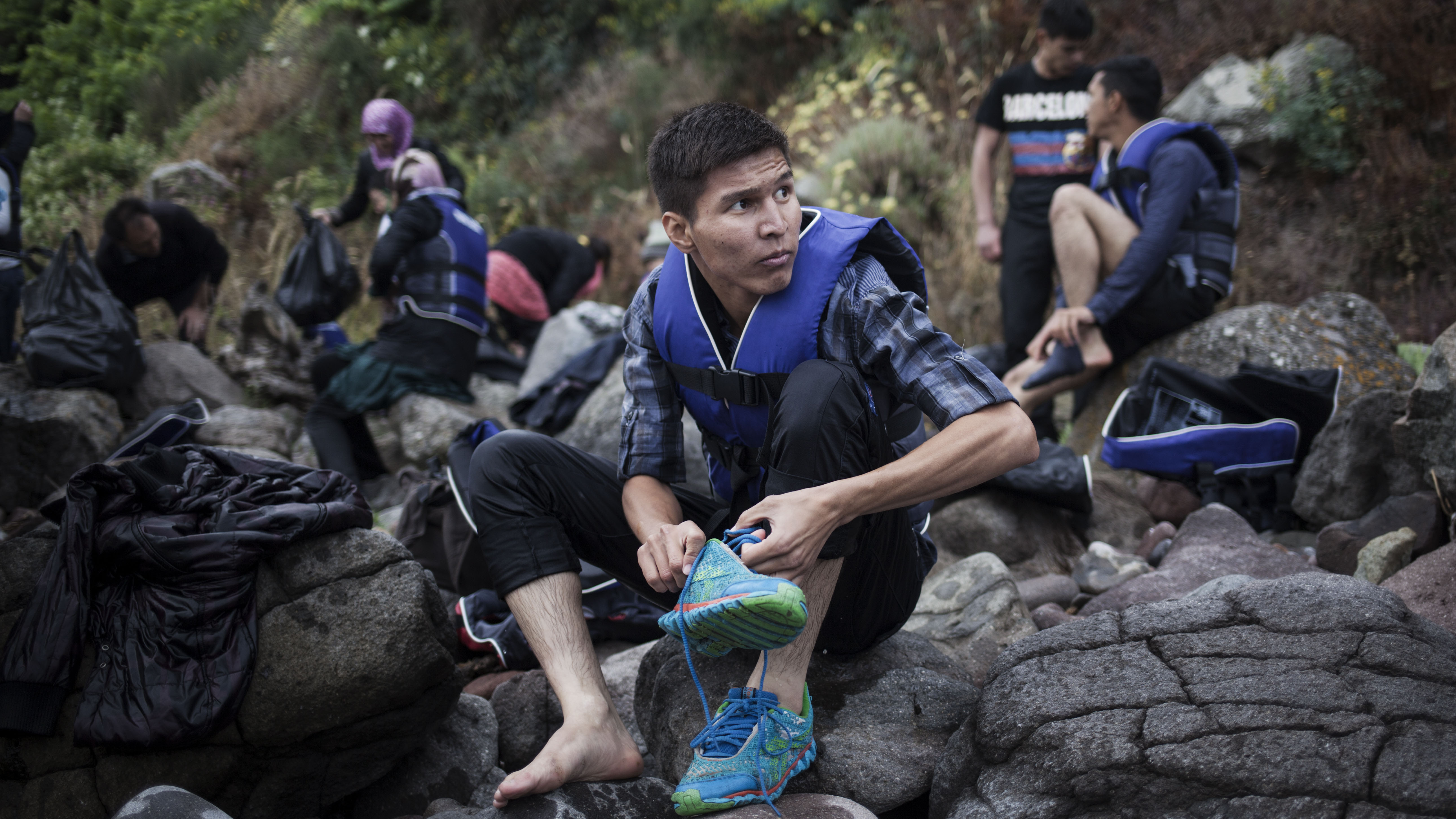 An Afghan refugee arrives on the island of Lesvos