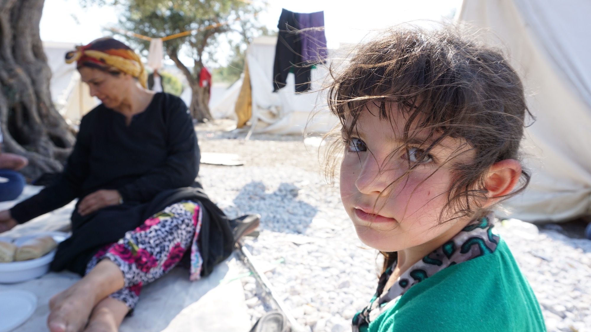 A child at a makeshift camp for refugees and migrants on the Greek island of Lesbos