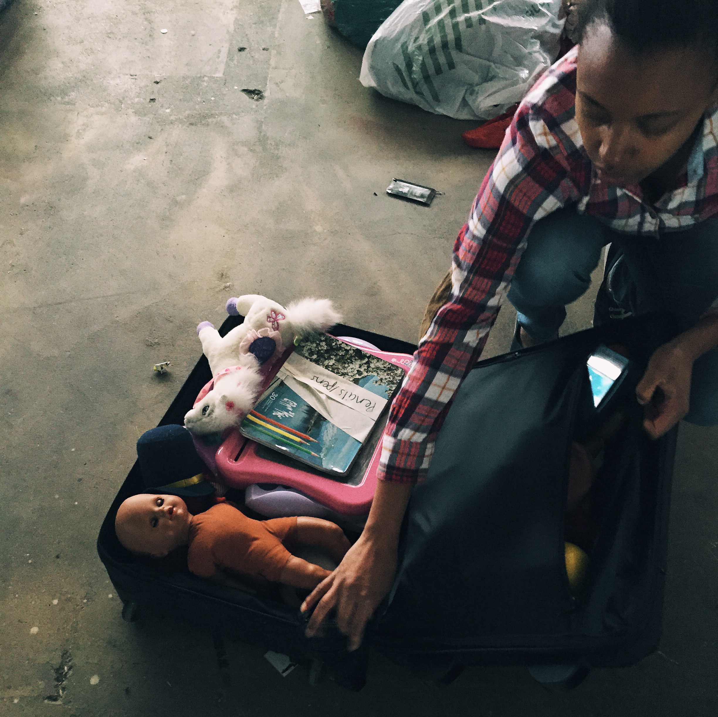 Volunteer packing donations for children