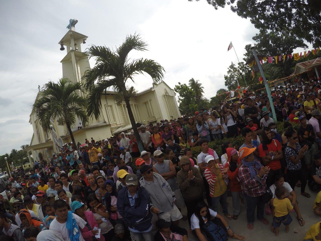 Mourners gather in the Philippines' town of Lianga on 13 September 2015 for the funeral of Dionel Campos and Bello Sinzo, tribal leaders who were killed two weeks earlier by members of a paramilitary group