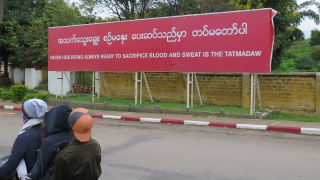 A sign in the Shan State capital of Taunggyi proclaims a motto of the Myanmar military, which is known as the Tatmadaw, in this photo from October 2015