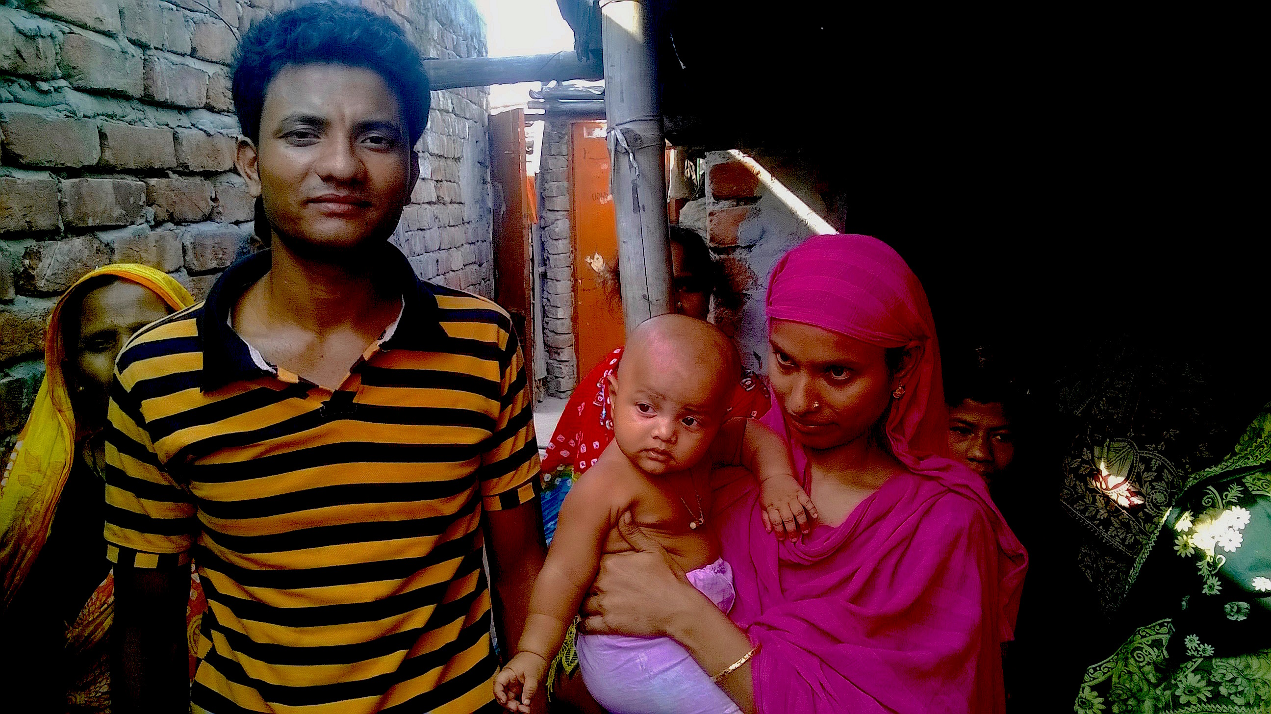 Al-Amin and Fatima in a slum in the Bangladesh capital of Dhaka in October 2015 where they moved when their farmland was lost to river erosion