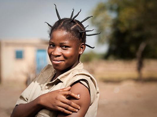 Edwinge Nana, 19, after vaccination in the village of Koubri. Edwinge’s little brother Charles died of meningitis at age 7.