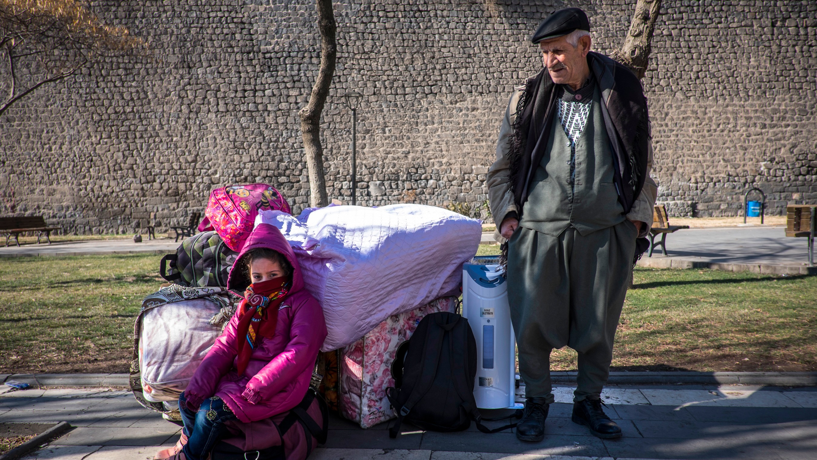Residents of Sur in Diyarbakir flee an expanded curfew. Kurdish human rights organisations say fighting across southeastern Turkey has displaced 200,000 people in the last two months alone. Turkish authorities put the number at 93,000.