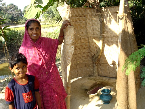 Woman and her new latrine.
Kalma Union, Rajshahi District, Rajshahi Division, Bangladesh.