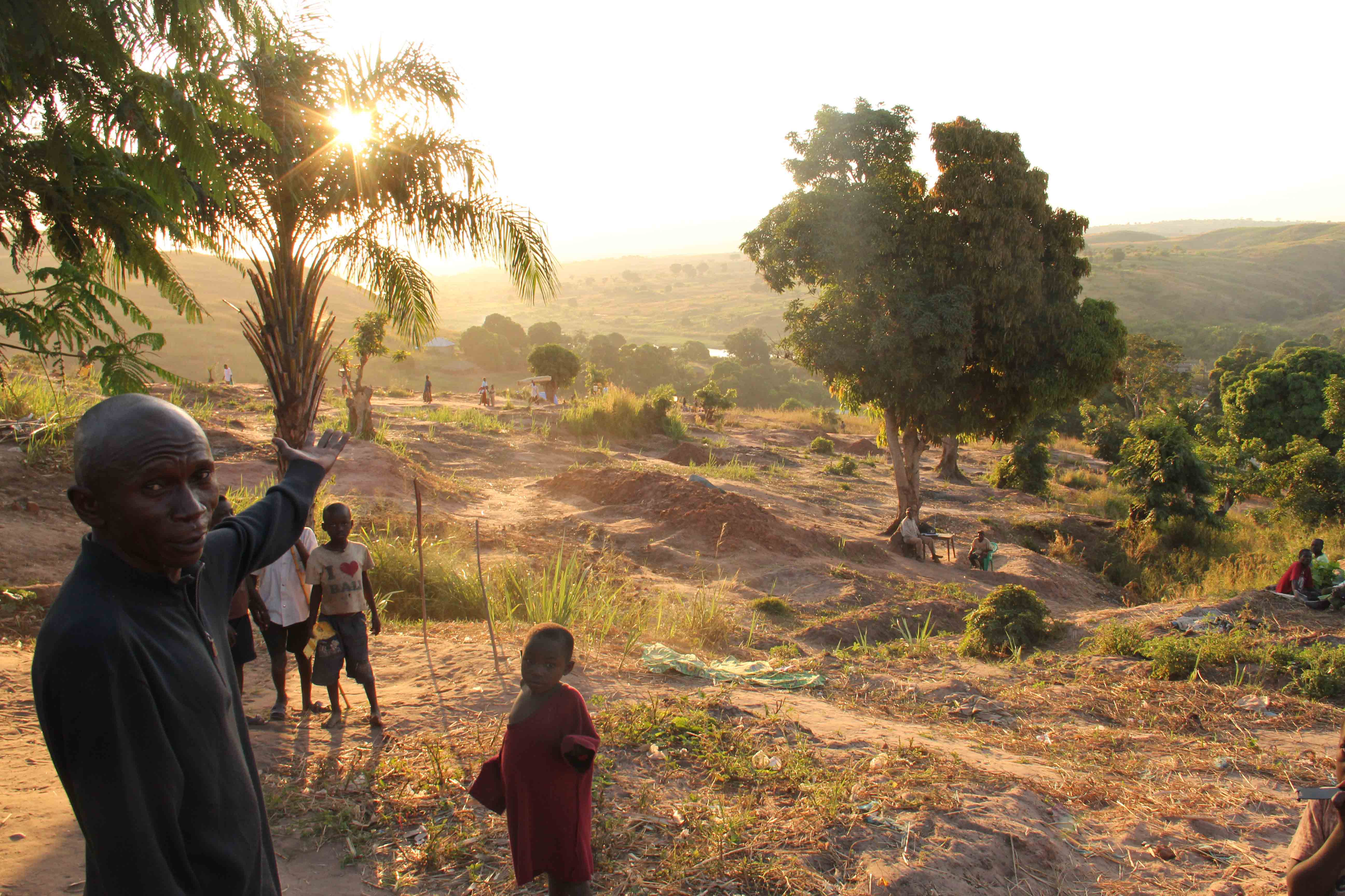 Displaced civilian points to site of dismantled IDP camp
