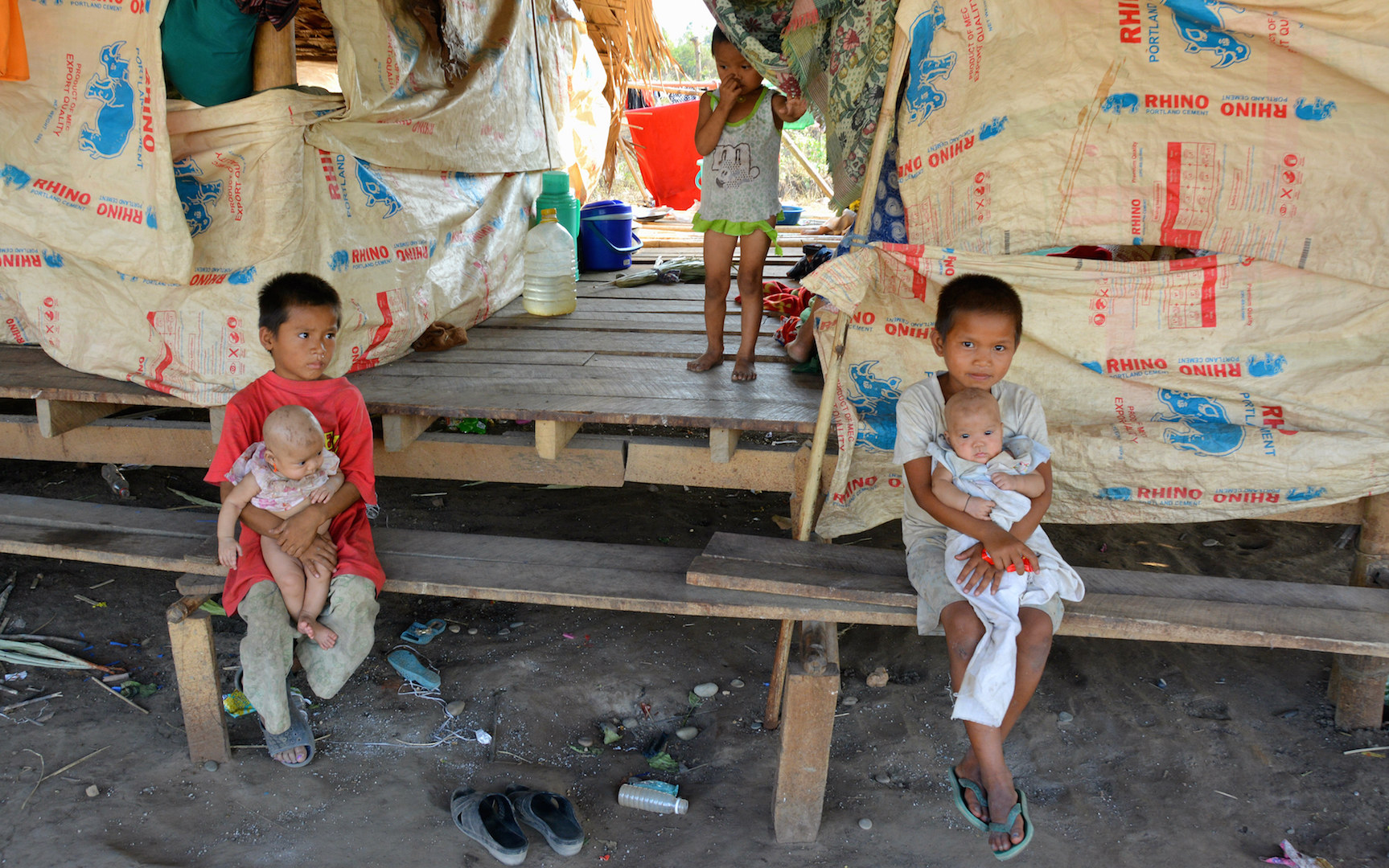 Children displaced by fighting in Myanmar's Kayin State in a makeshift shelter