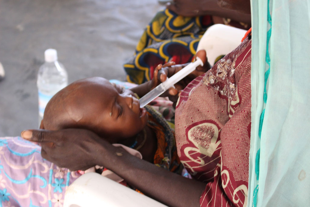 A severely malnourished child receives treatment in a clinic in Banki, north-east Nigeria
