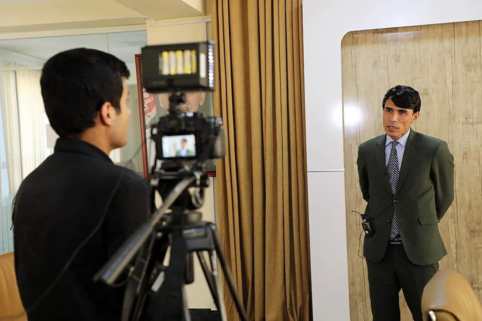 As a former spokesperson for Afghanistan's Environmental Protection Agency, Rahimi frequently interviewed with national media outlets. When the Taliban returned, his very public presence put his life at risk.