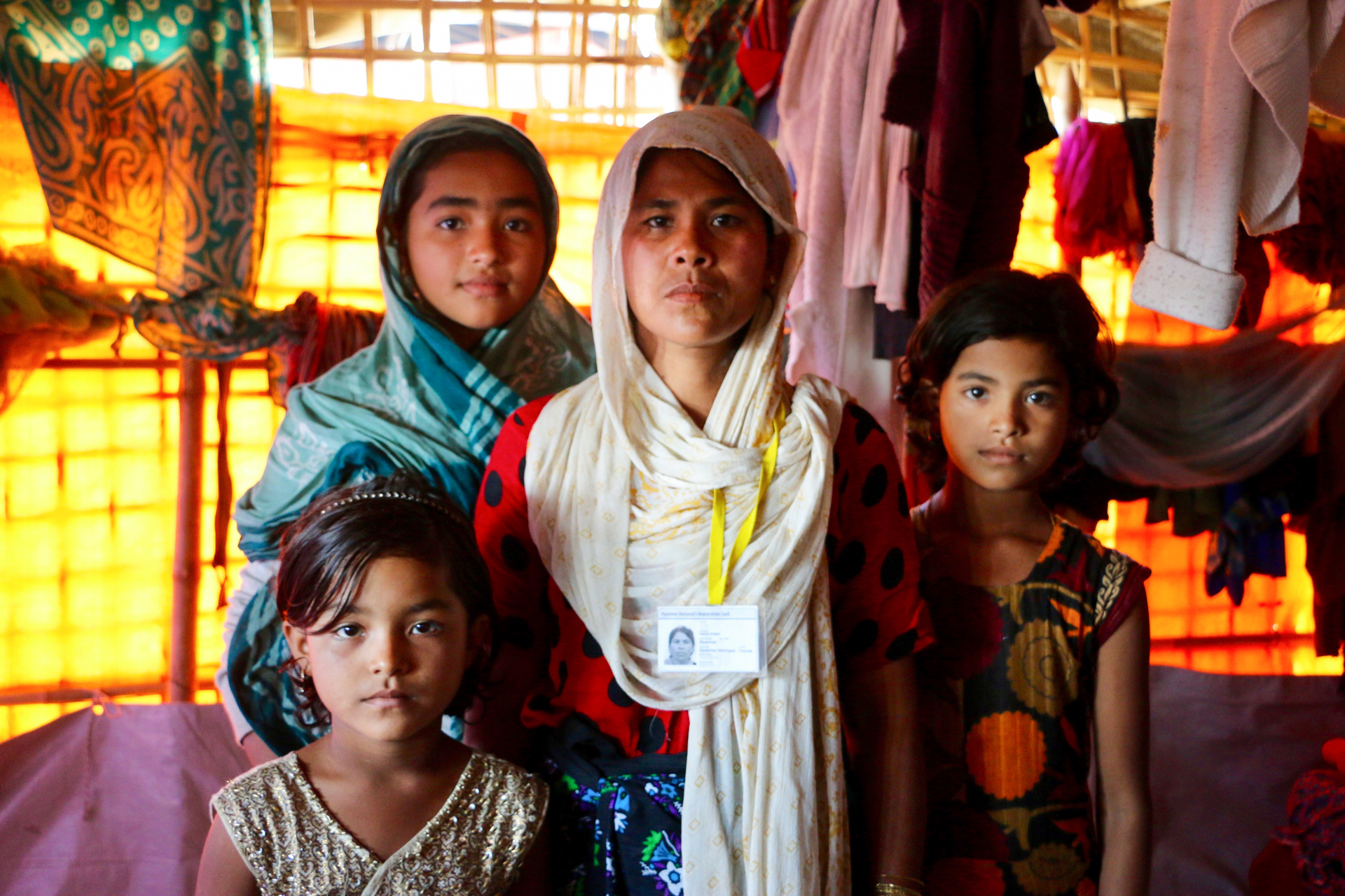 Hasina Khatun says she ran into her burning home to save her family's ID cards. \