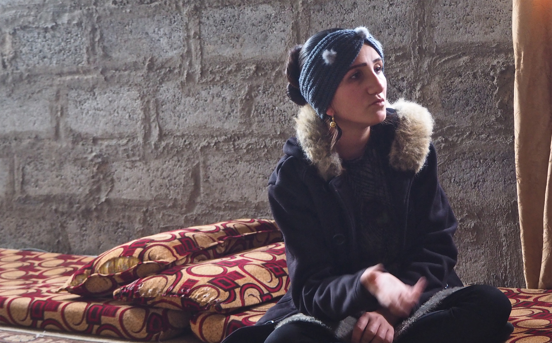 A Yazidi survivor in Iraq who has returned to her village.