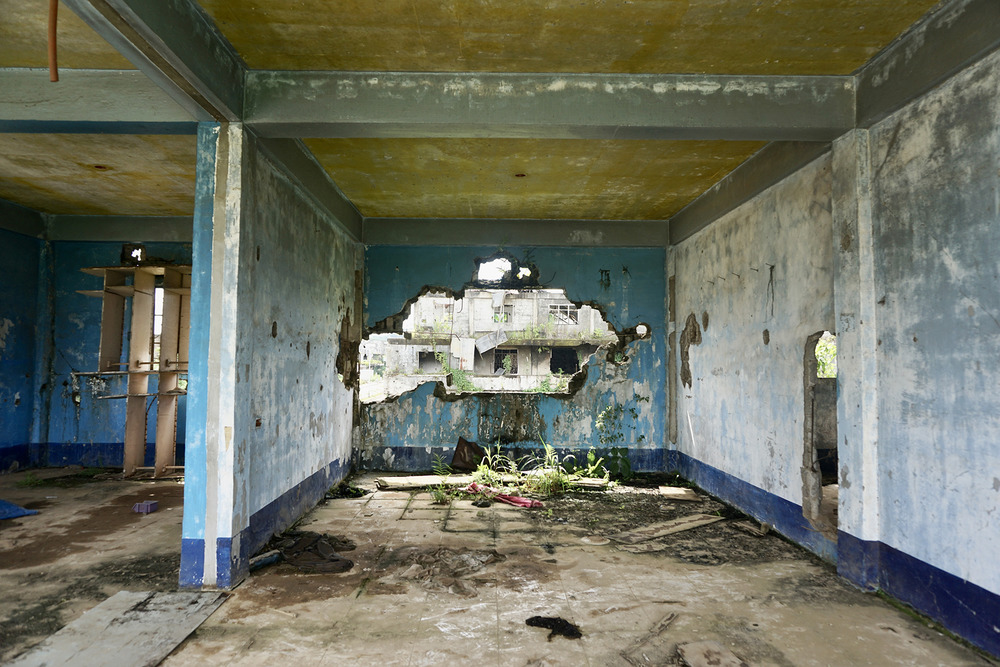 Inside a destroyed building in Marawi City. Those working to demobilise ex-fighters here often say,