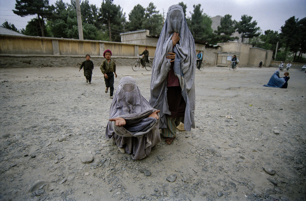 Women beg on the streets in Kabul while living under Taliban rule