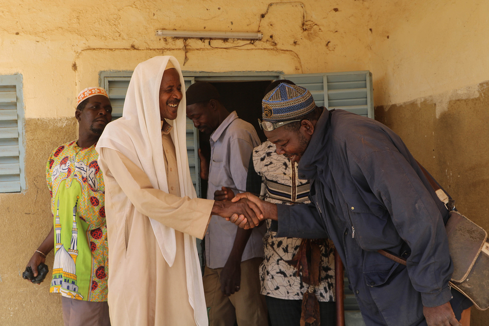 An image of a group of Koglweogo members paying respects to their leader Boureima Nadbanka