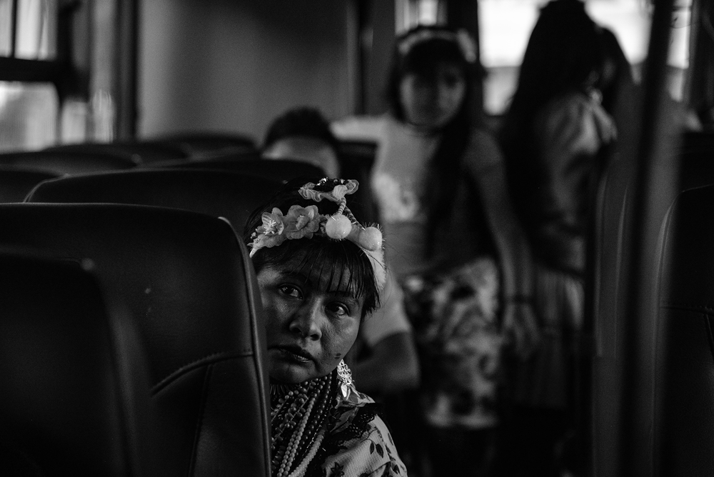 Emberá women board the buses that will take them back to the reservation in the province of Risaralda, in Colombia’s western jungles.