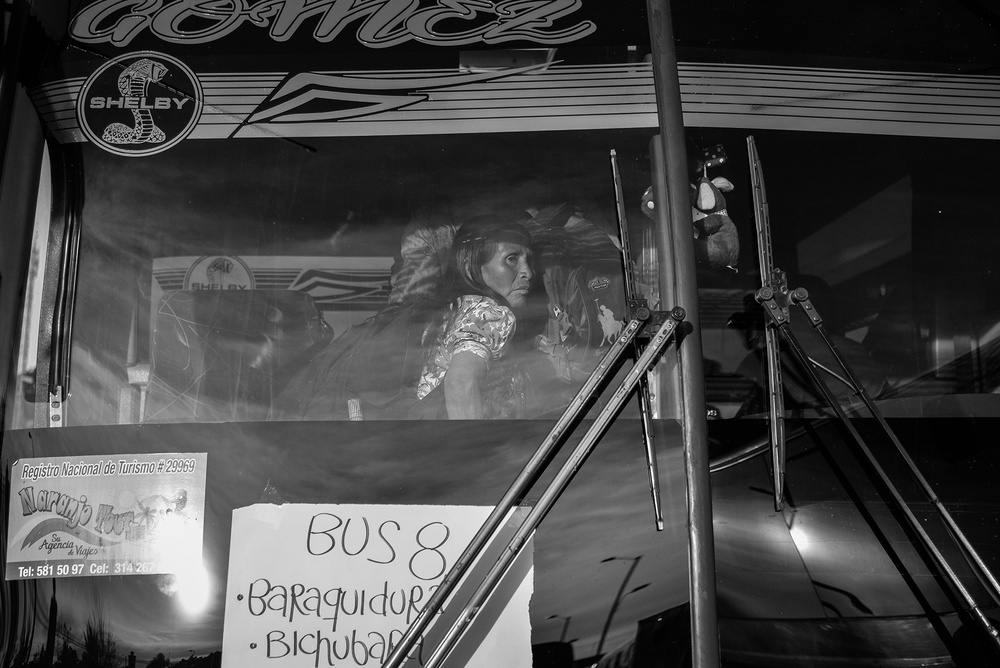 Emberá women board the buses that will take them back to the reservation in the province of Risaralda, in Colombia’s western jungles.