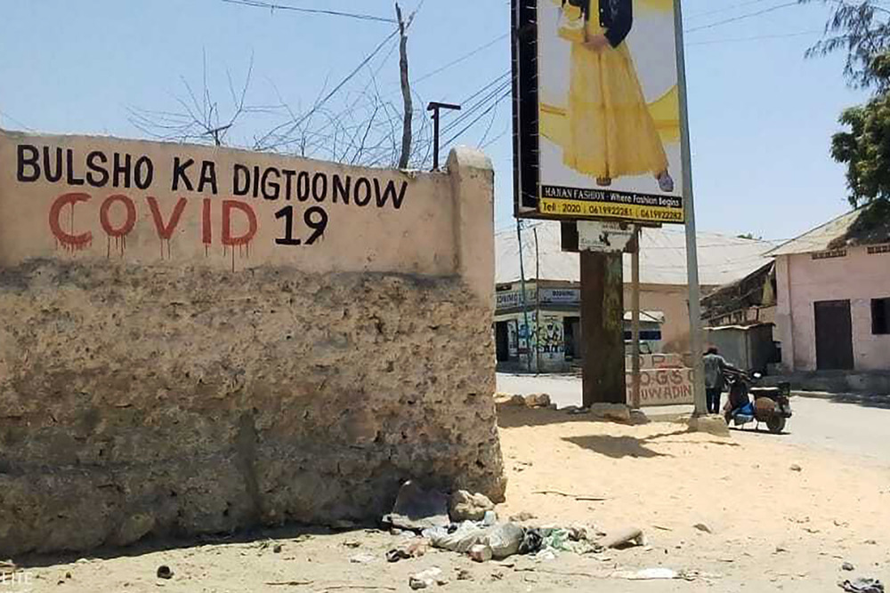 “Beware COVID-19” – graffiti in the Ceelgaab district of Mogadishu. The government has mounted public information campaigns warning of the threat of the virus, on the radio and in print