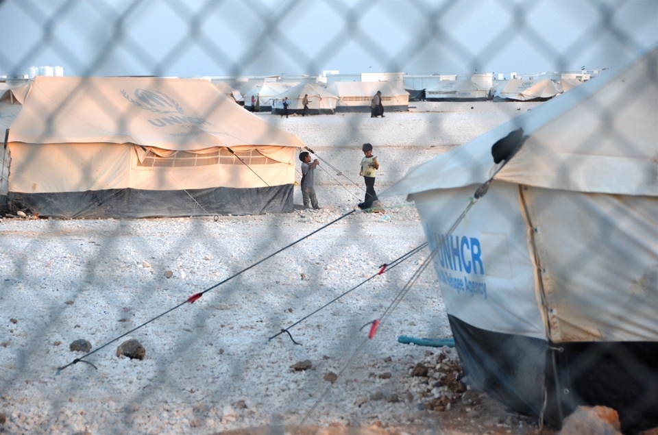 Camp seen behind wire