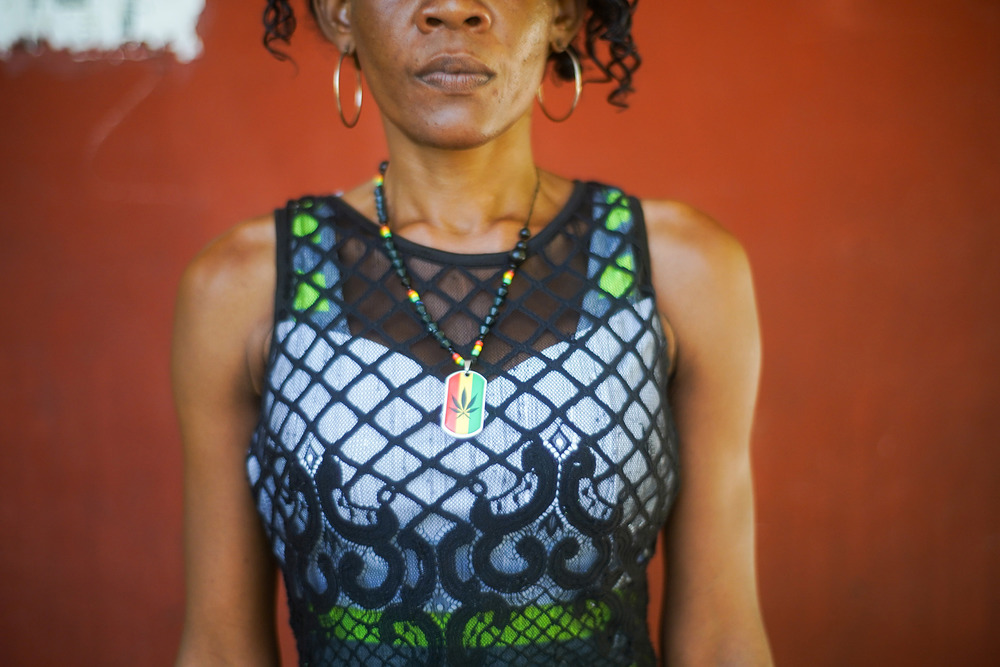 An image of a woman with the top half of her face cut off by the camera.