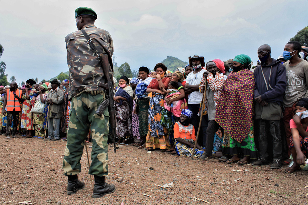 Displaced people await a distribution of aid from a foundation operated by Congolese First Lady Denise Nyakéru Tshisekedi.