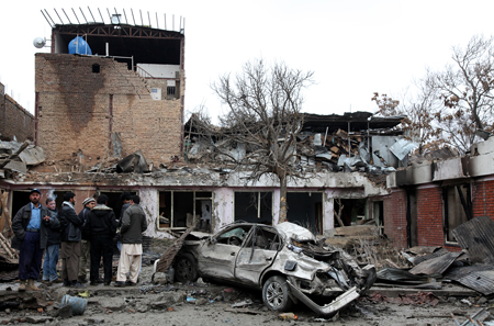 Over a dozen people were killed and 30 were wounded in an attack on a guest house in central Kabul on 26 February, the government said